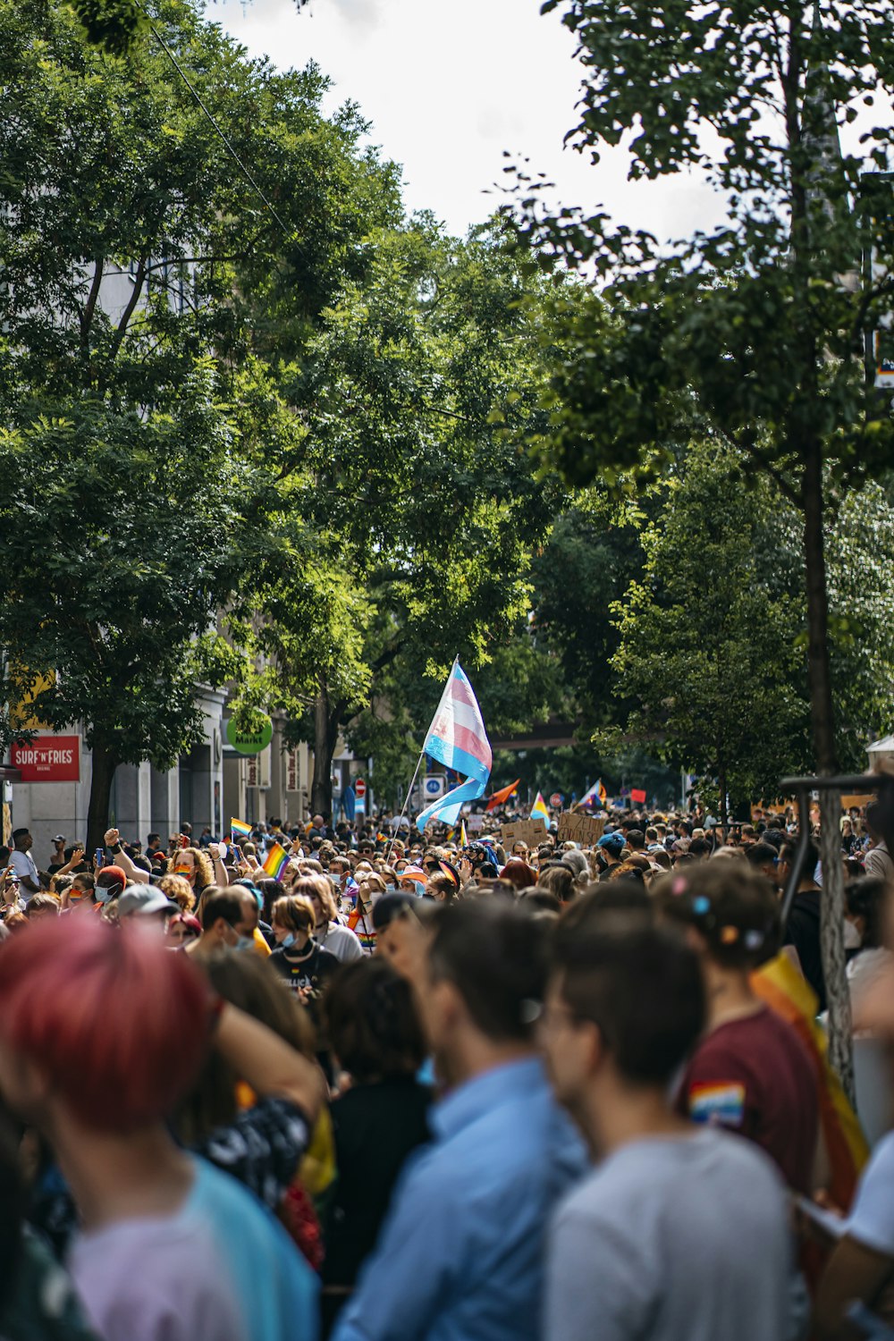 a crowd of people in a street