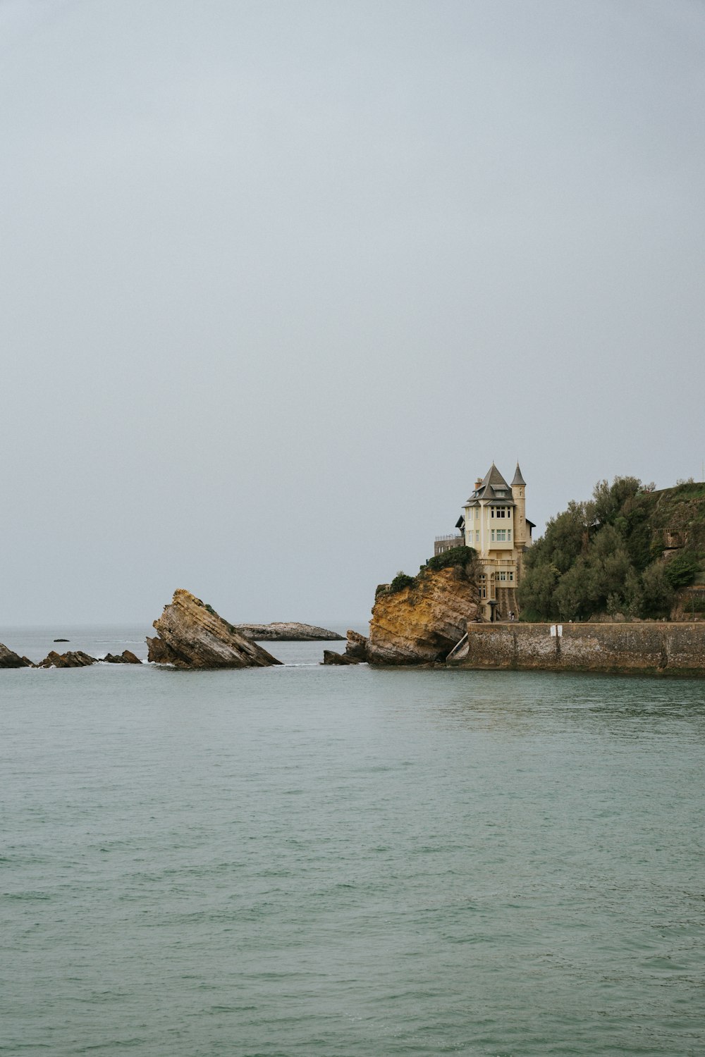 a building on a rocky island