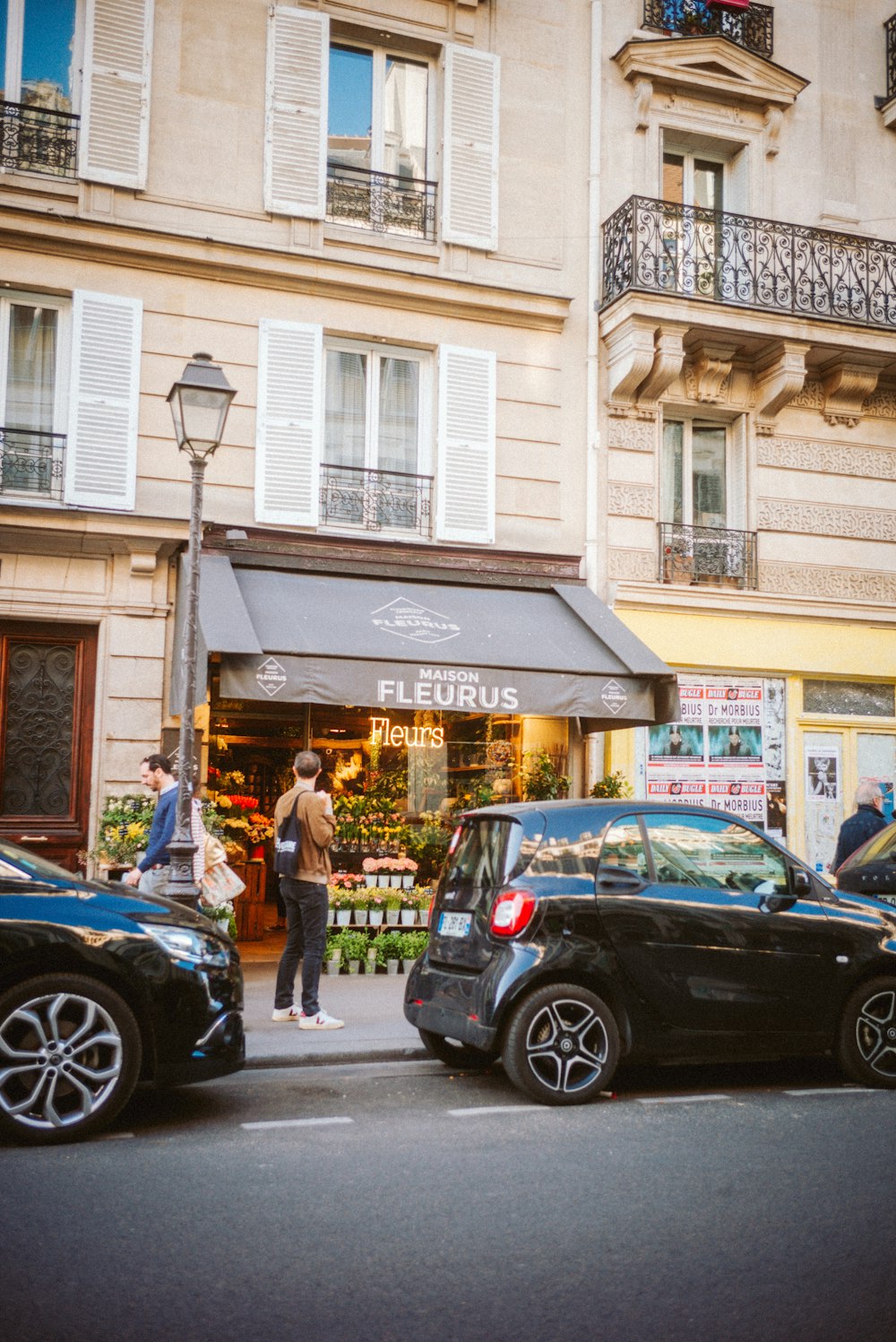 a person standing outside a store