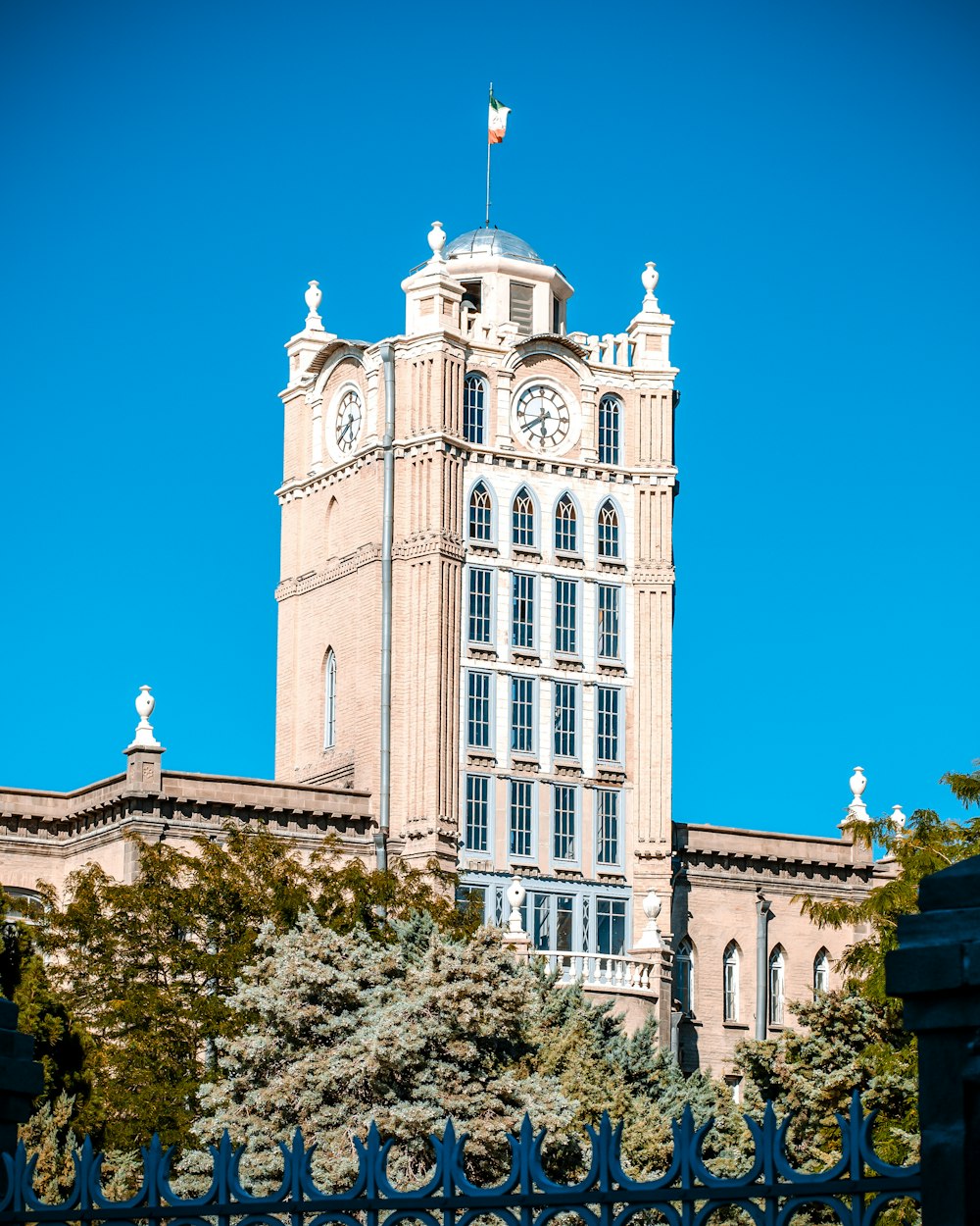 a tall building with a clock on the top of it