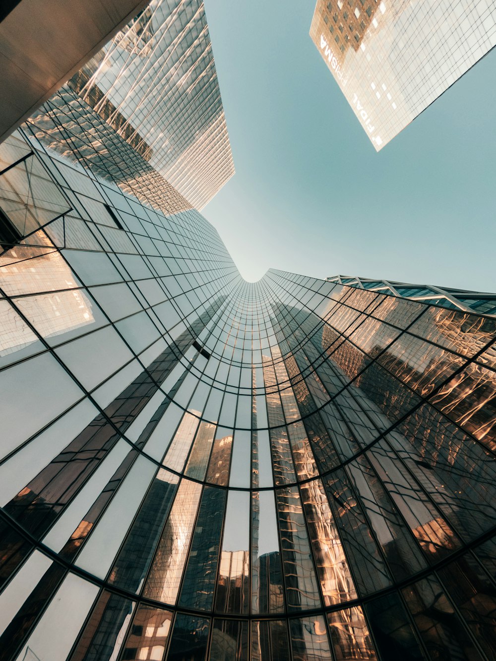 a group of tall buildings that are next to each other