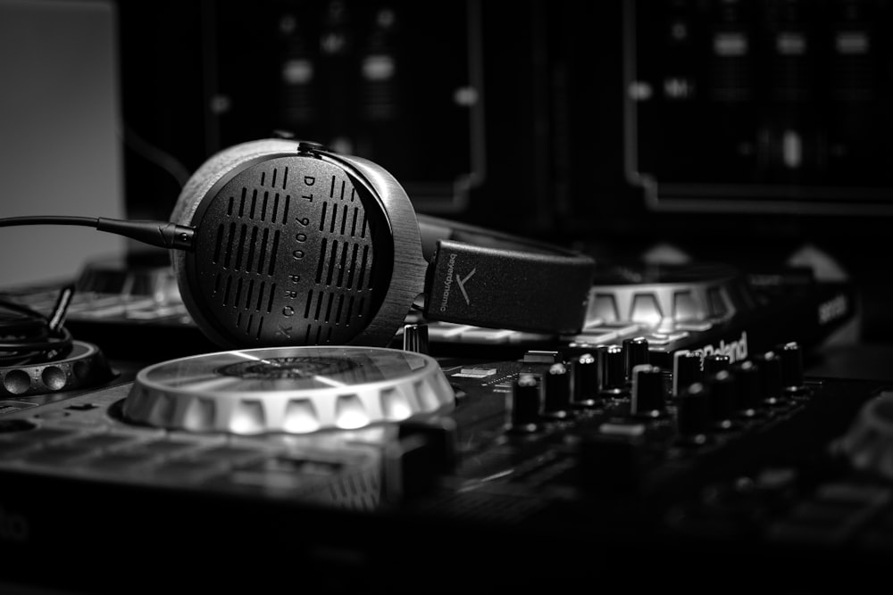 a black and white photo of a mixing board