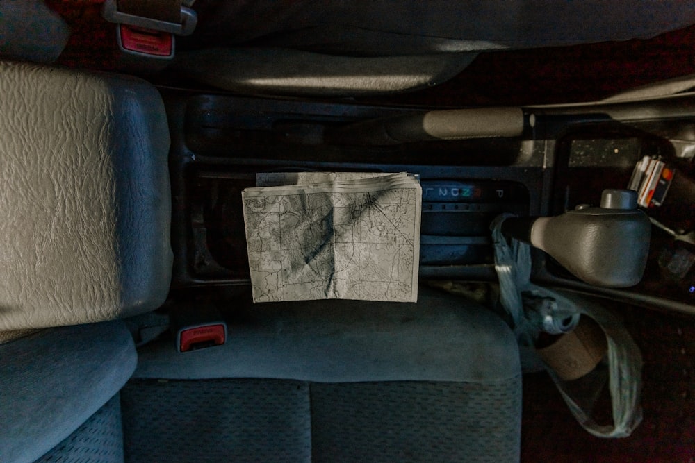 a napkin is sitting on the seat of a car
