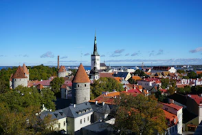 a view of a city with a church tower