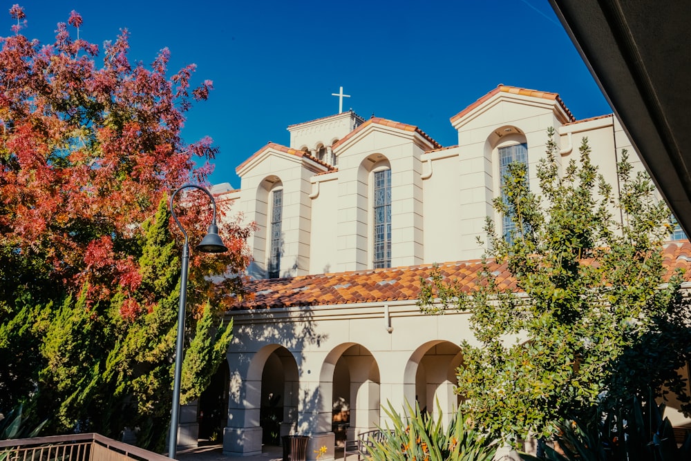 a church with a cross on the top of it