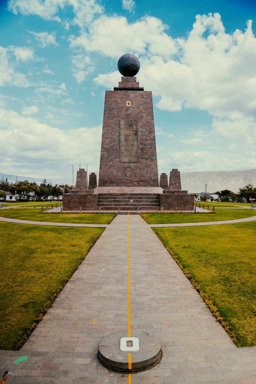 a monument with a ball on top of it