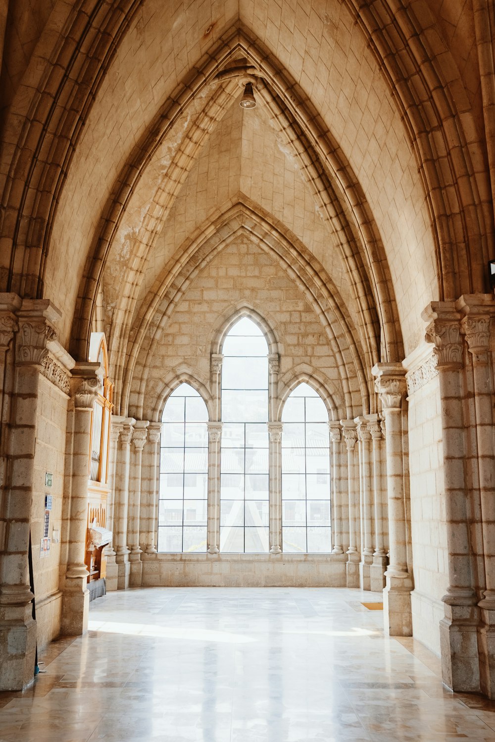 a large room with a large arched window