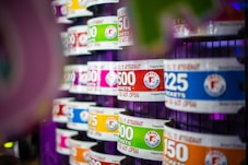 a close up of many different colored labels on a wall