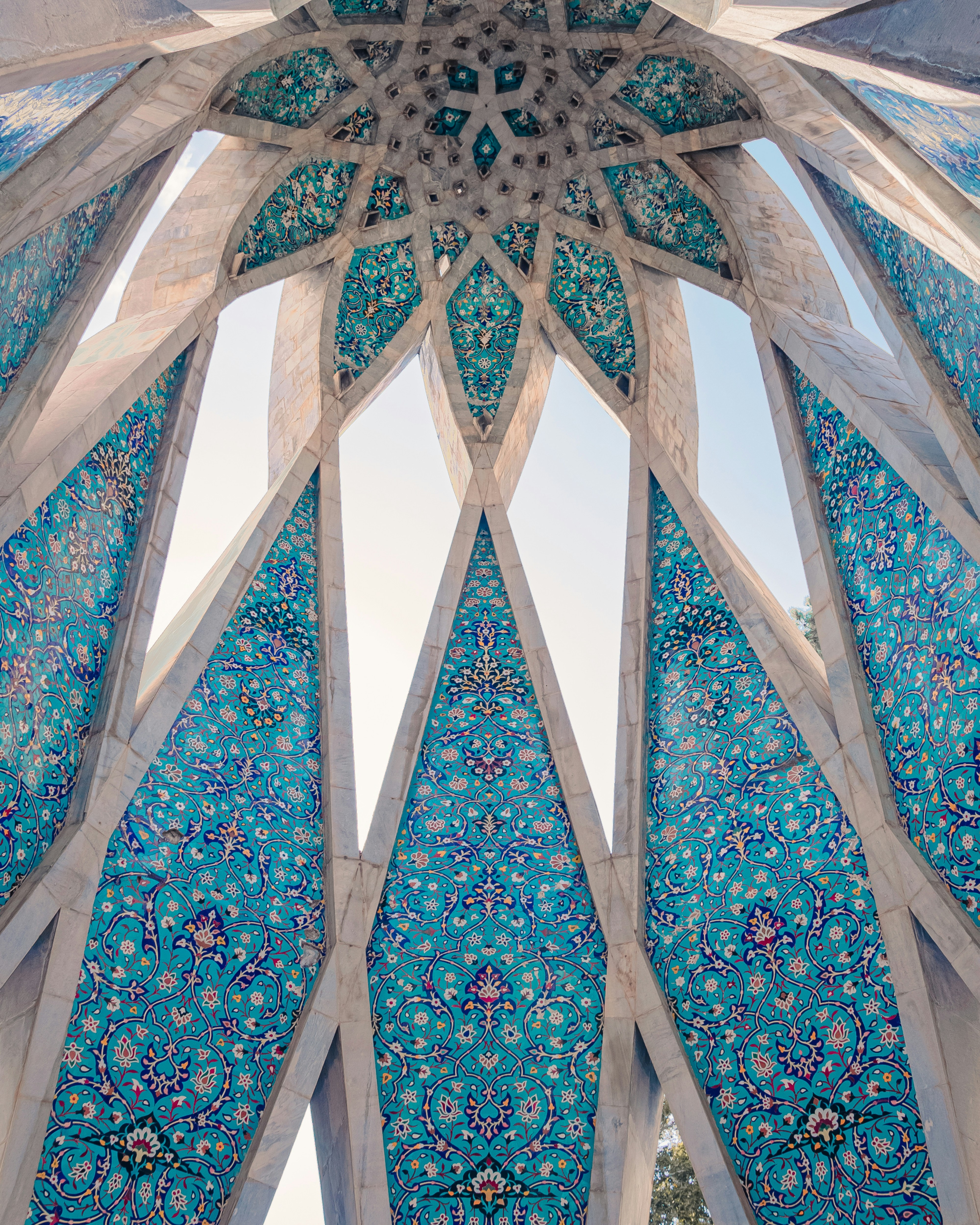 an intricately designed building with a sky background