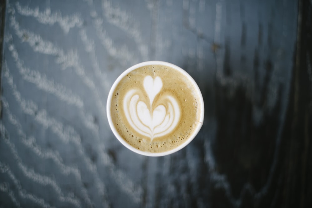 a cappuccino with a heart on it