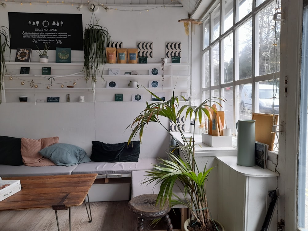 a living room with a couch and a table