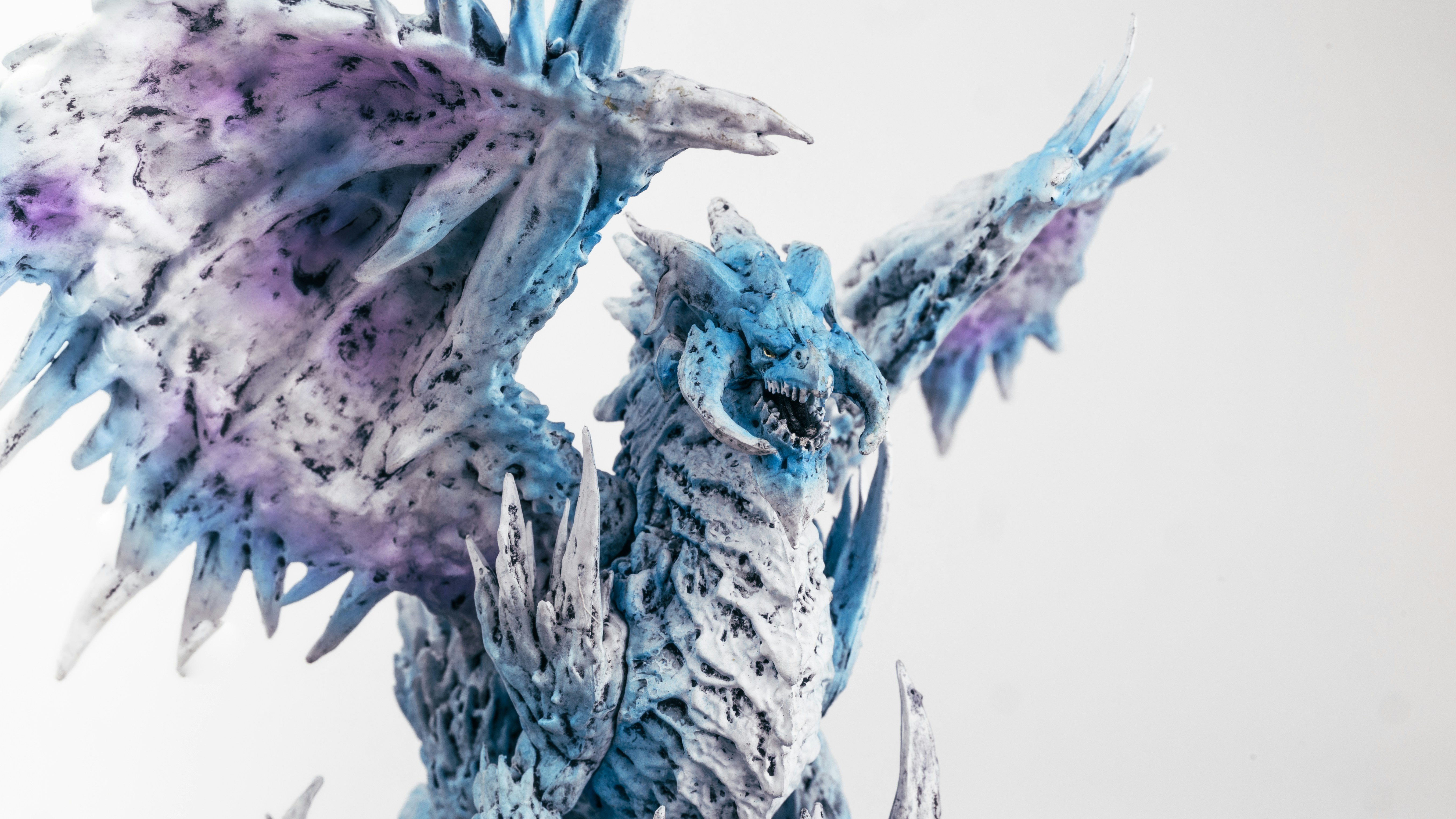 A close up of a blue and white dragon statue photo – Free Poland Image ...