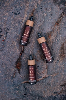 Sarvix Oil bottles lined up with certification badges displayed, symbolizing strength and trust.