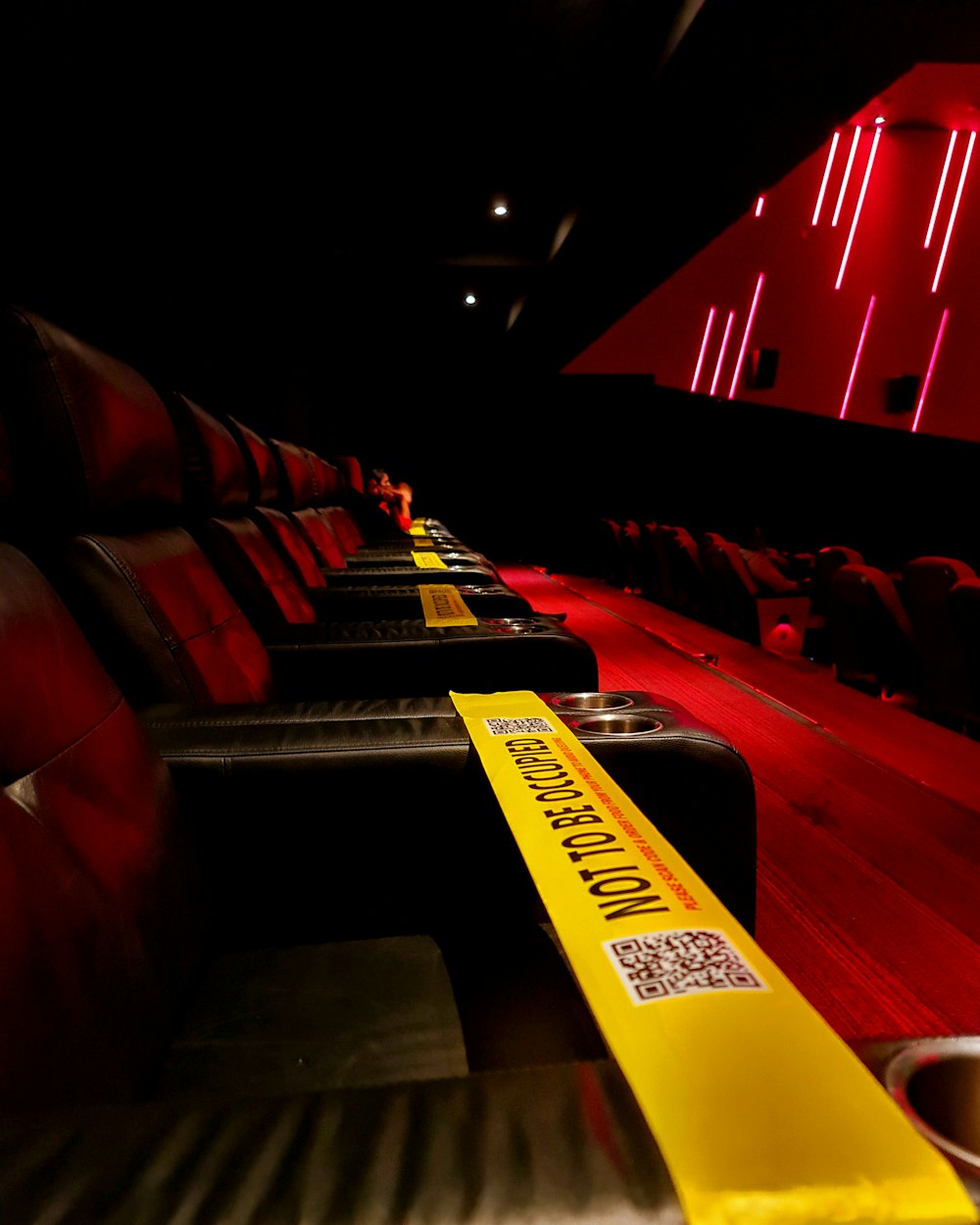 a row of empty seats in a theater
