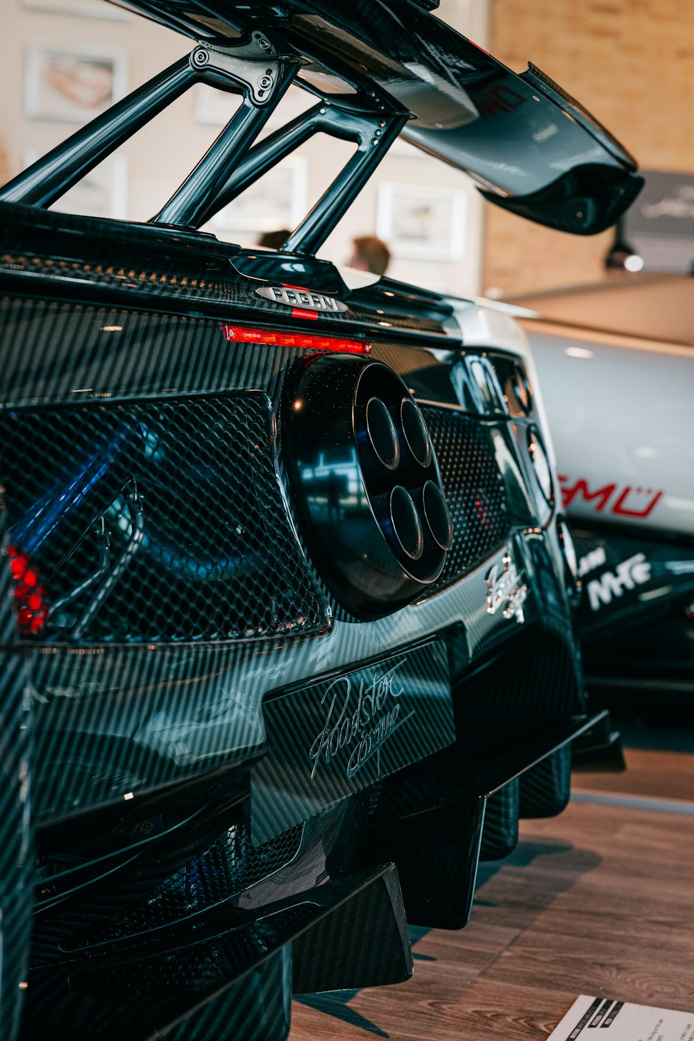 a close up of a car on display at a car show