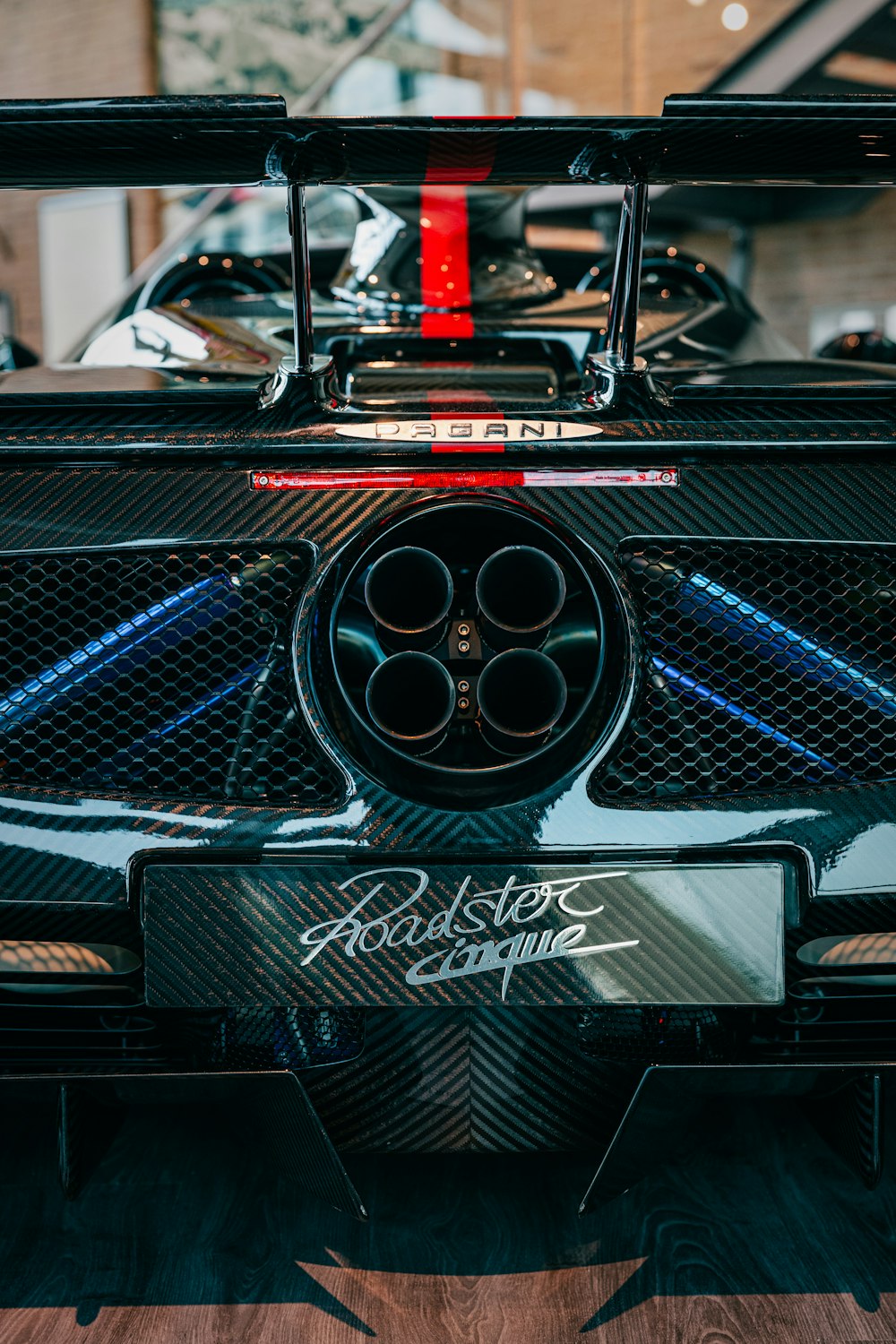 a close up of the rear end of a sports car