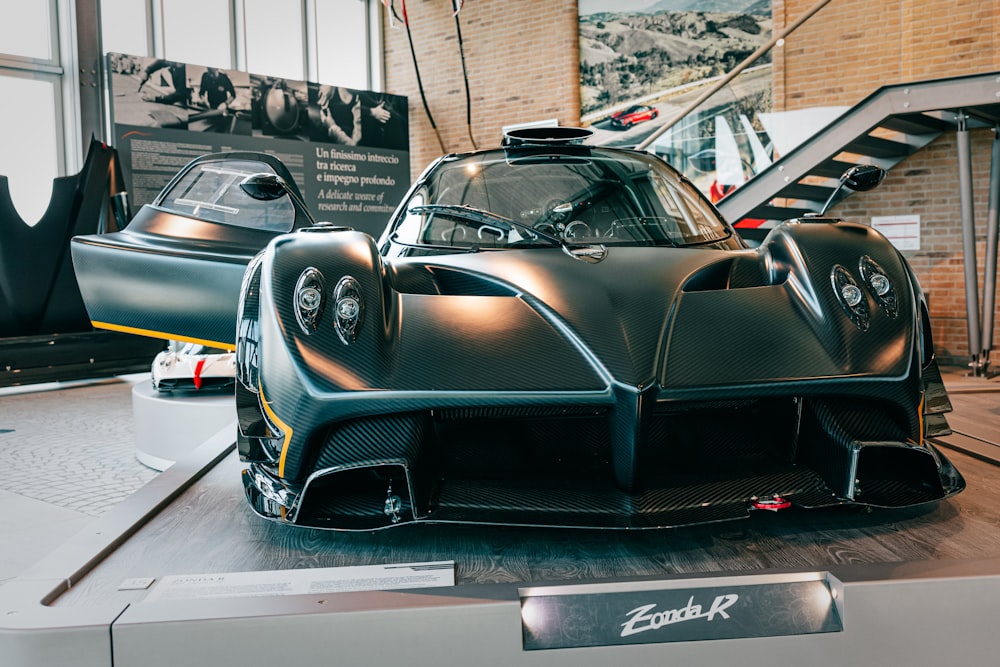 a car is on display in a museum