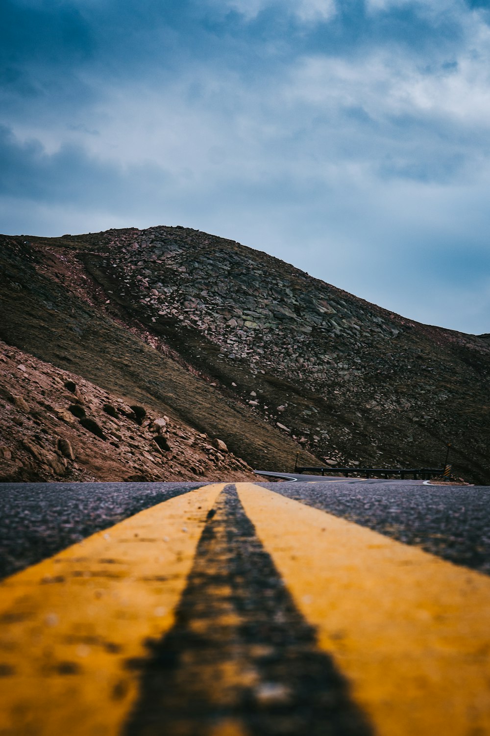 a yellow line on the side of a road