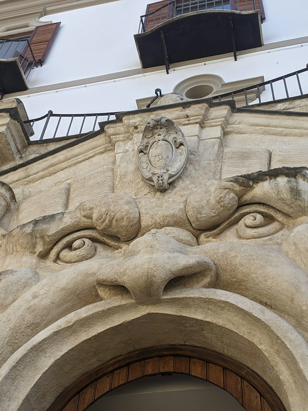a close up of a face on a building