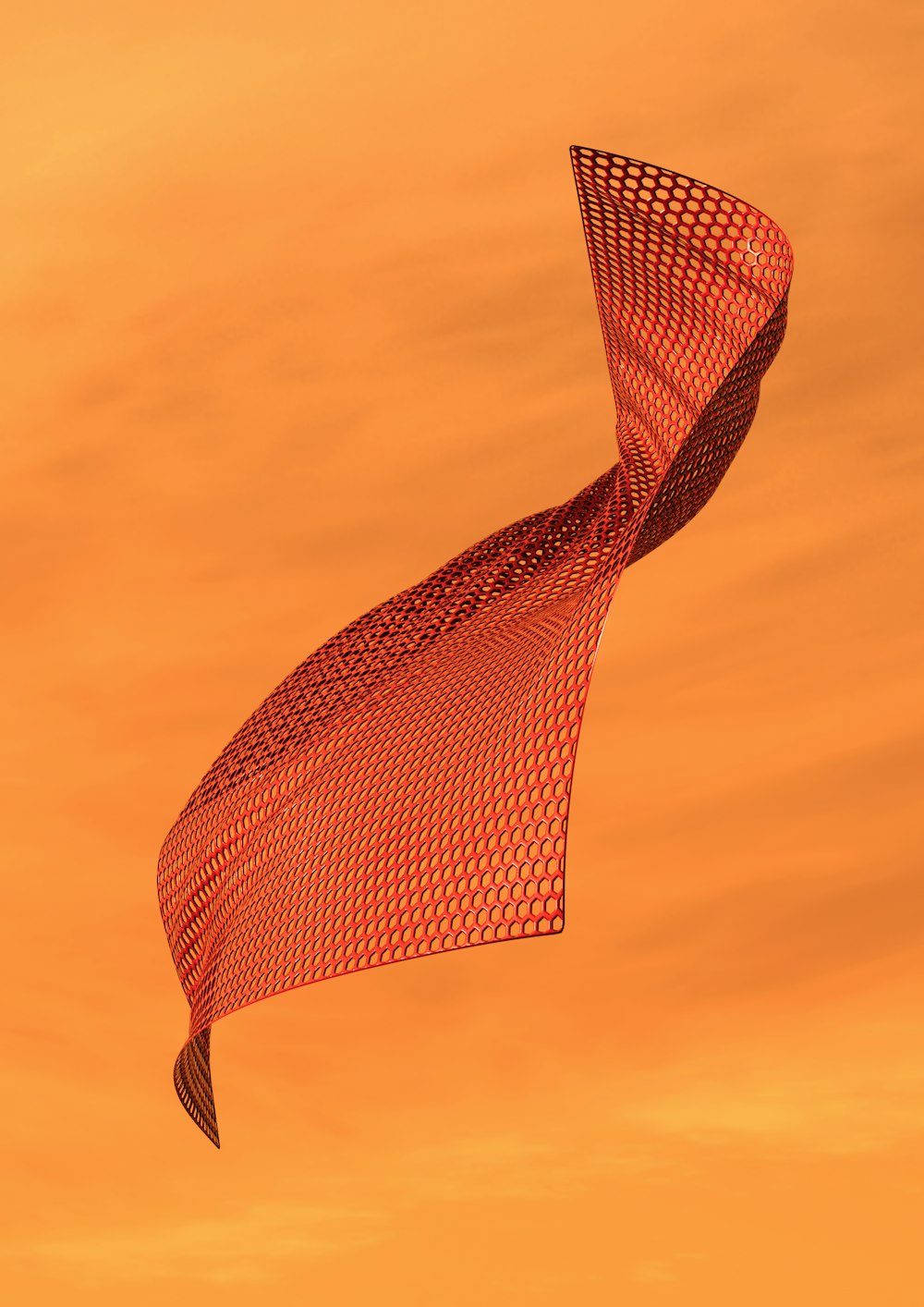 a red kite flying in the air with a yellow sky in the background