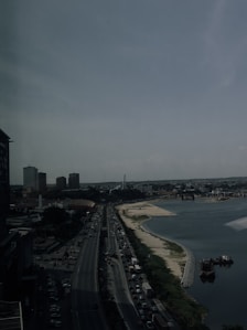 a view of a body of water with a city in the background