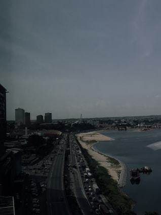 a view of a body of water with a city in the background