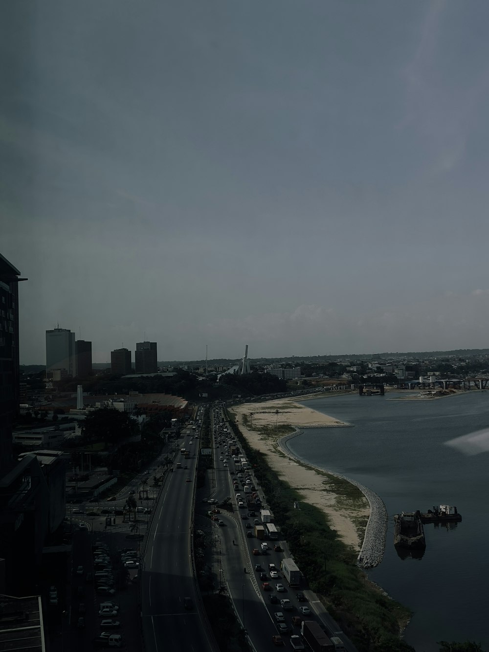 a view of a body of water with a city in the background