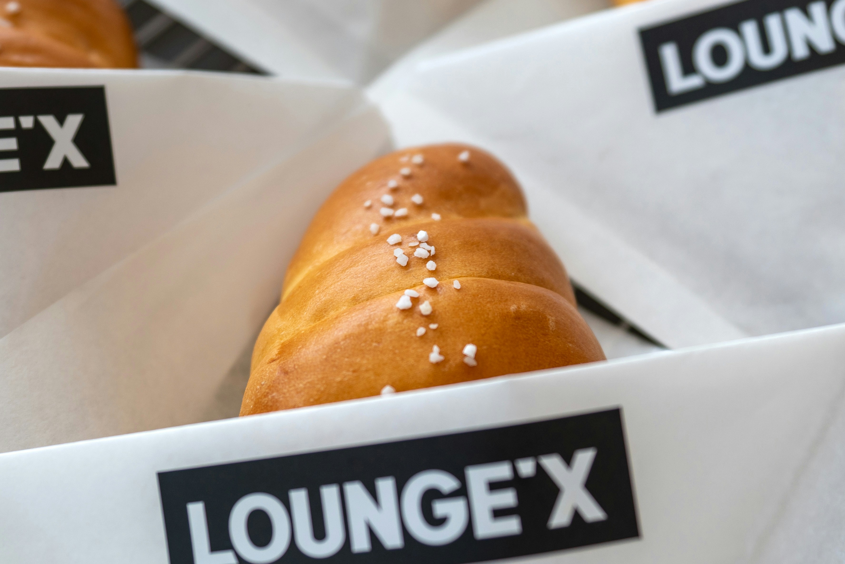 a close up of a doughnut in a box, 