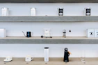 Various coffee accessories including grinders and filters arranged neatly
