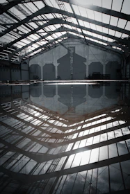 High-tech structural drying equipment operating inside a flooded commercial space.