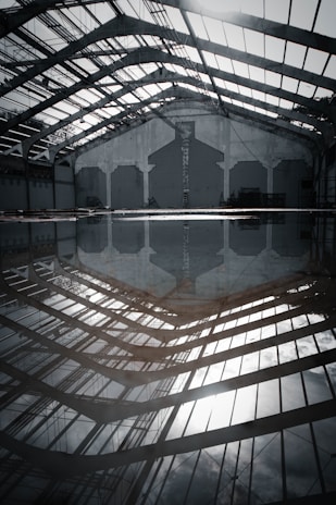 Before-and-after photo showing a water-damaged commercial space restored to dry and clean condition.