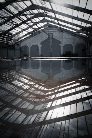 Before and after photos of a flooded commercial space restored to pristine condition.