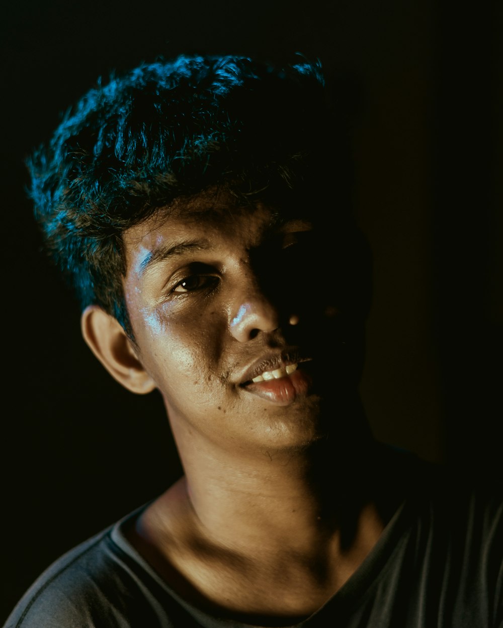 a close up of a person wearing a black shirt