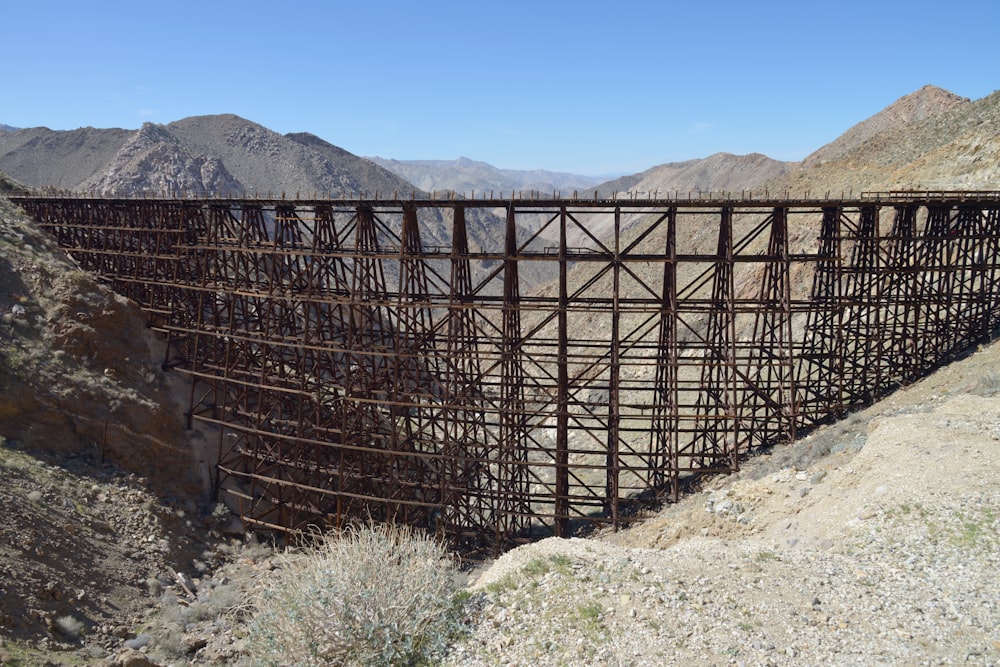 a large metal structure sitting on top of a mountain