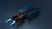 A futuristic spacecraft with sleek, aerodynamic design, featuring multiple blue wings and orange accents. It emits bright blue thruster flames, conveying a sense of speed and technology.