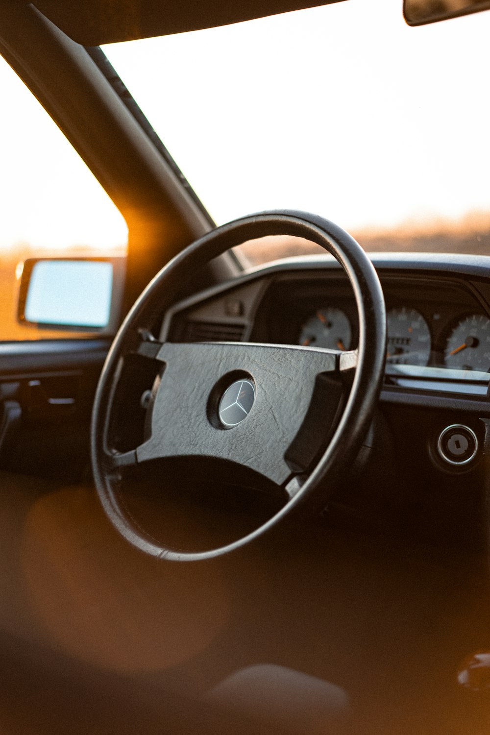 a steering wheel and dashboard of a vehicle