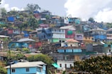 a hillside with many houses on top of it