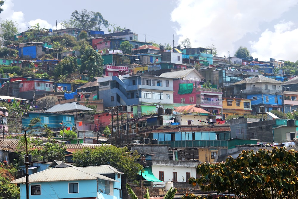 a hillside with many houses on top of it