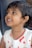 A happy child wearing a stylish outfit from minikids.