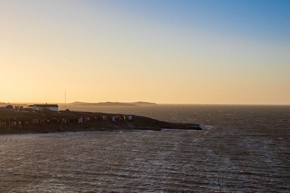 a view of a body of water at sunset