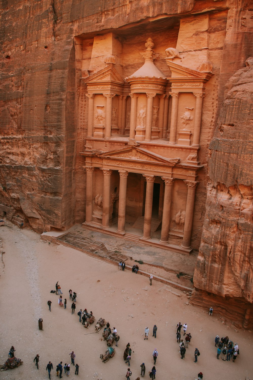 a group of people standing in front of a building