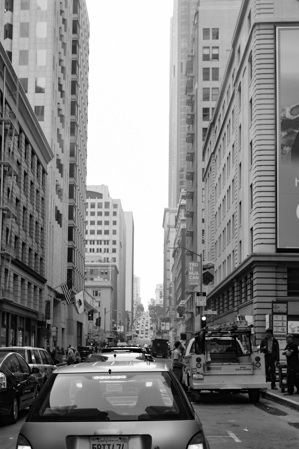 a black and white photo of a city street