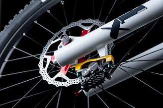 a close up of a bike tire and spokes