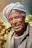 an old man with a turban on his head
