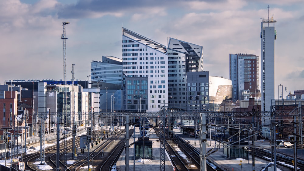 a view of a city with a train on the tracks