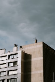 An apartment building's rooftop showcasing fiber-optic cables being installed.