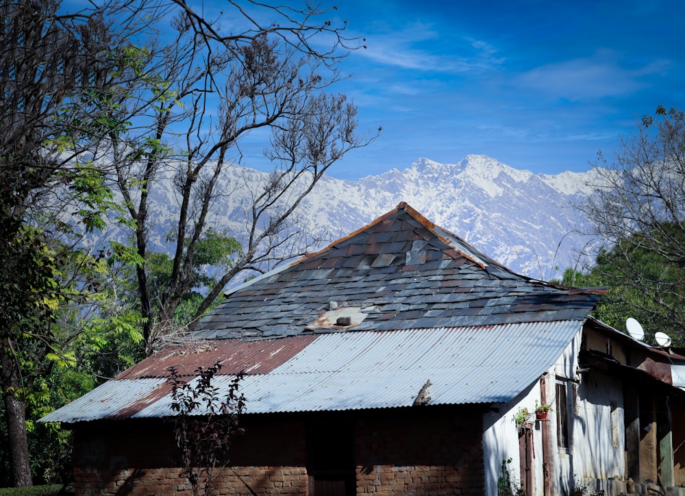 a building with a mountain in the background