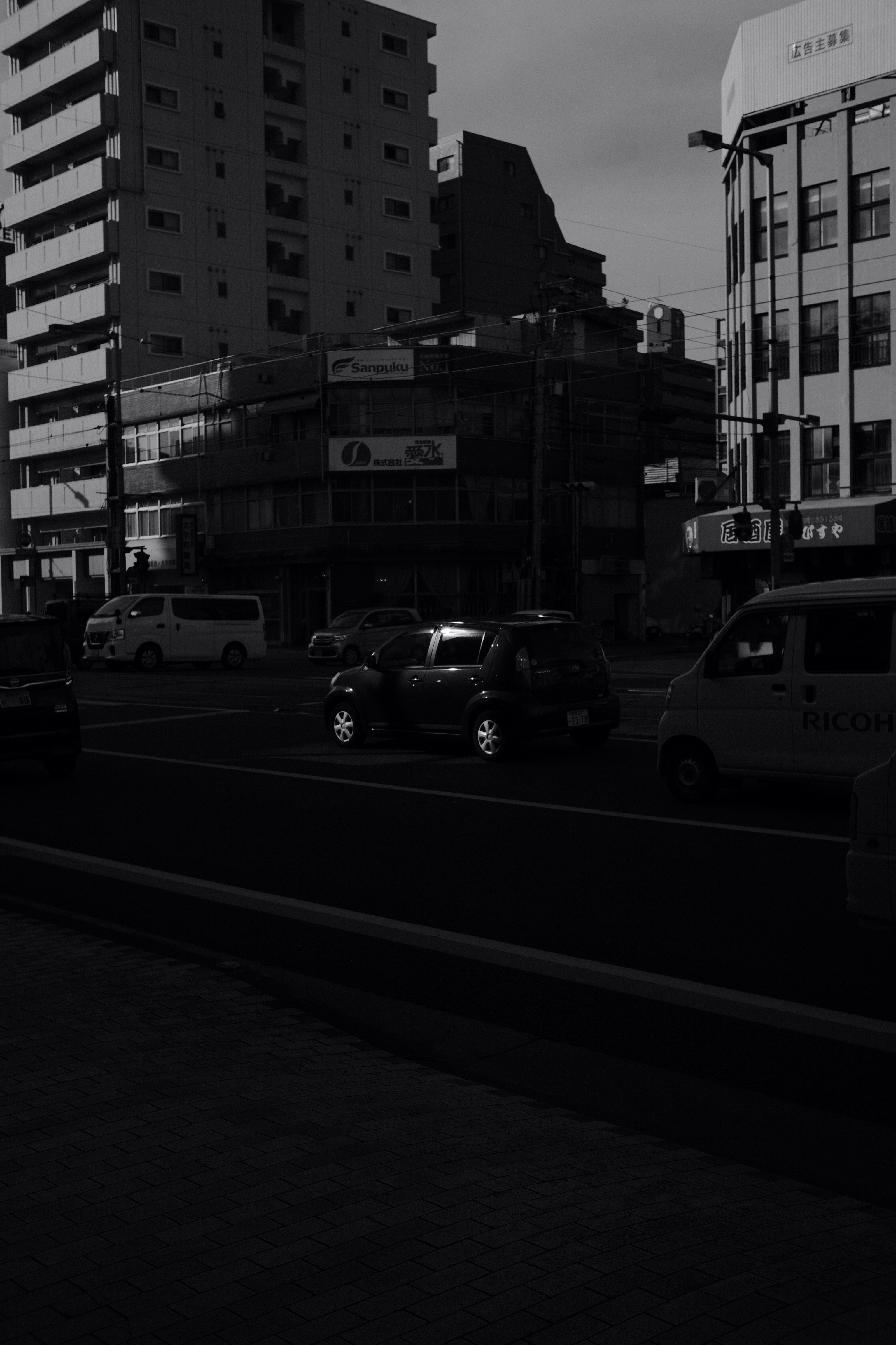 a car driving on a city street