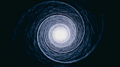 a black and white photo of a circular object