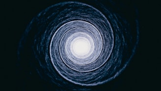 a black and white photo of a circular object